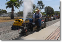 Tom Downing on his Fourney Steam Locomotive