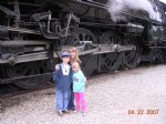 Charlie Ally and Becky stand in front of the masive drivers of 3751. 
By: Charlie Giordano