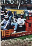 Picture Title - Charlie and Daniel ride the work caboose into the station