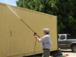 Picture Title - Tom Pressure Washing the container 