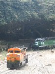 Picture Title - An outbound Burlington Northern Train passes a BNSF near the mainline spur to the SCLs yeard.